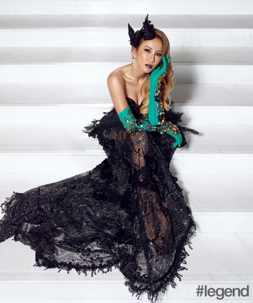 CoCo Lee wears dress and headpiece by Lawrence Xu, gloves by Delpozo and jewellery by Sunfeel